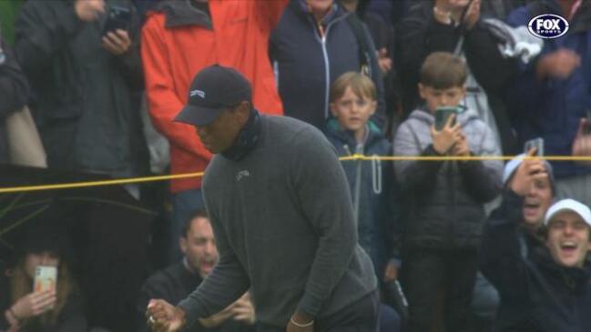 Magic putt brings out trademark Tiger fist pump