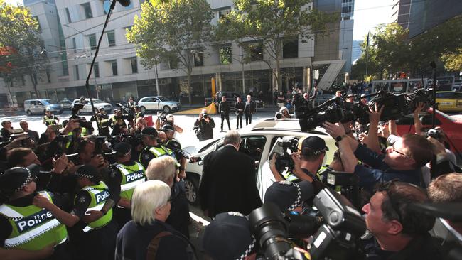 The crowd of media as Australia's most senior Catholic leaves court. Picture: AAP Image/Stefan Postles