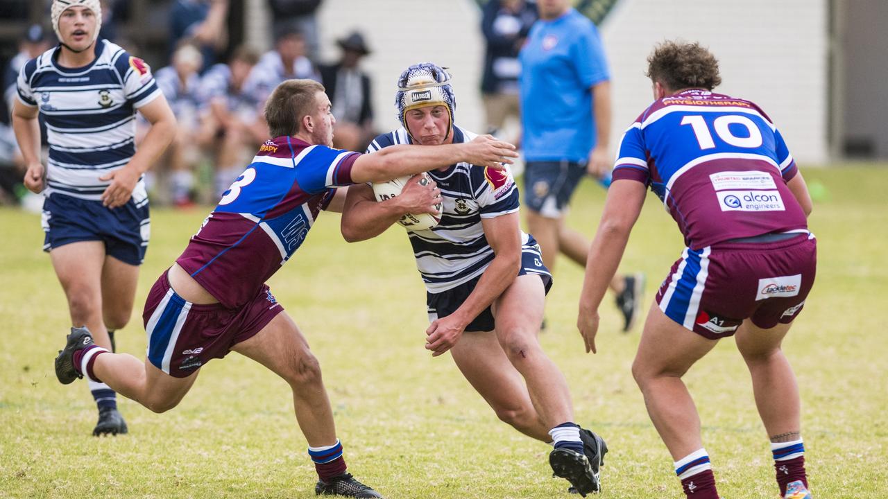 Darcy Carswell of St Marys College is tackled by Drew Timms of Wavell SHSPicture: Kevin Farmer