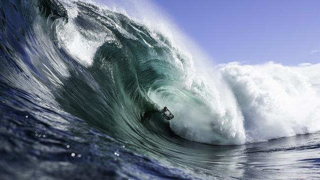 Tasmanian surfer Sam Lennox is in the running for a $30,000 prize. Picture: Stu Gibson