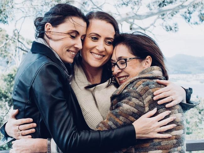 Sisters Natalie and Jacqui Gray share a hug with their Mum Diane. Picture: Supplied