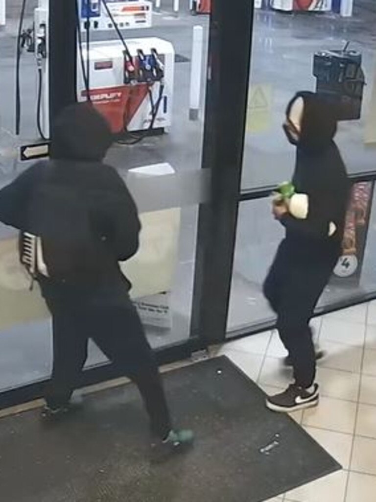 CCTV footage captures two men allegedly raiding a WA petrol station ...