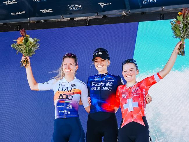 Race winner New Zealand's Ally Wollaston of Team FDJ-Suez (C), second placed Netherlands' Karlijn Swinkels of UAE Team ADQ (L), and third placed Switzerland's Noemi Ruegg of Team EF Education-Oatly on the podium. Picture: AFP