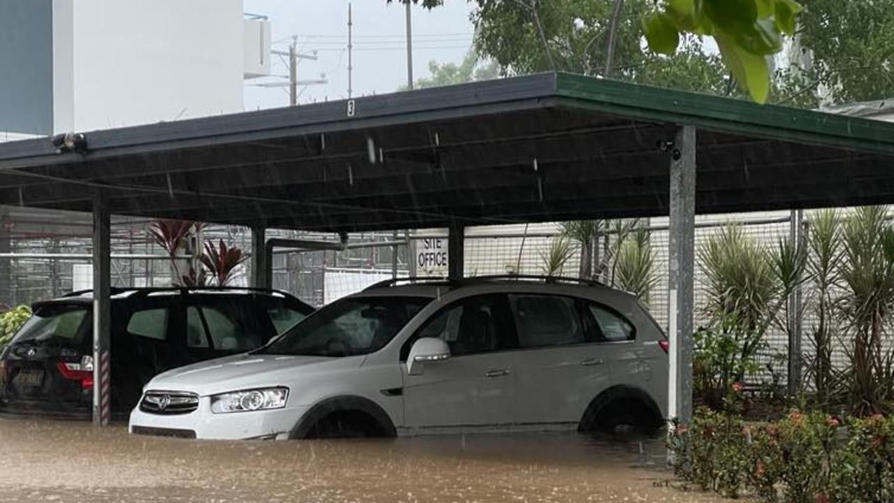 Cars at an apartment complex on Clifton Rd were fast going under at noon on December 17. Picture: Bronwyn Farr