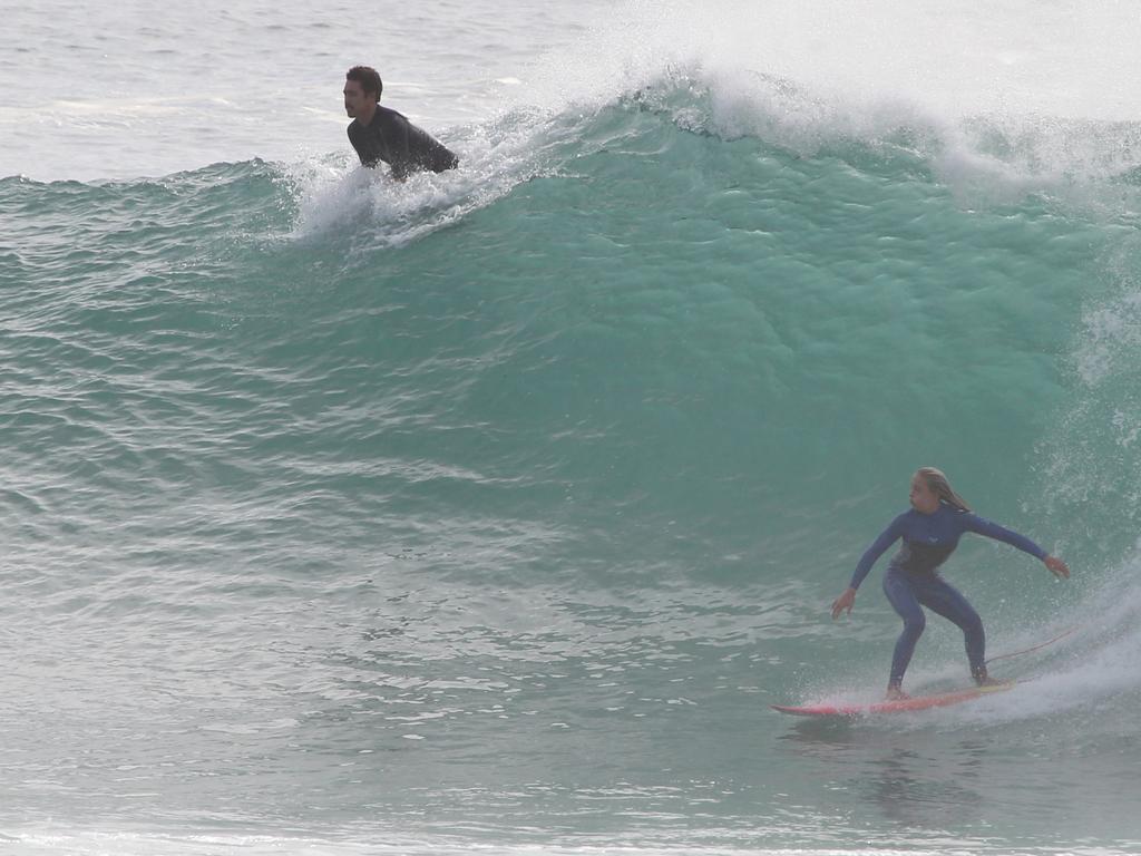 Surfers pictured enjoying good swell and near perfect waves at Snapper Rocks. Picture: Mike Batterham