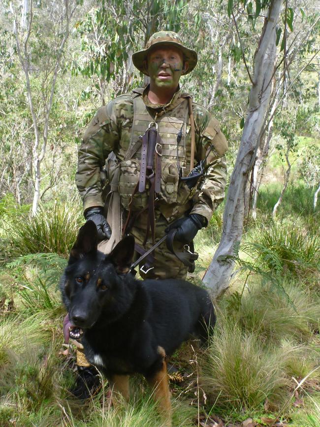 Luke Warburton and Chuck on the hunt for Malcolm Naden in 2012. Picture: Supplied