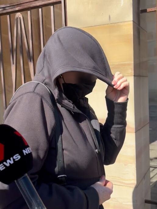 A woman in her 60s leaves Adelaide Magistrates court where she is charged with historic abuse of children as young as 12. Picture: Isabel McMillan