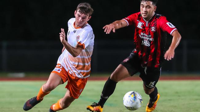 Harry Corica (left) in action for Cairns FC.