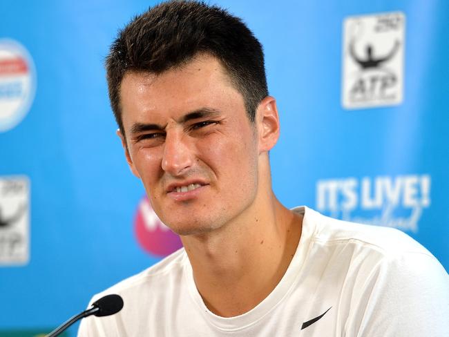 Bernard Tomic speaks at a press conference.