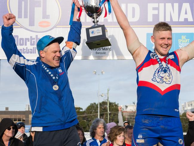 Coach Steve Saddington celebrates North Heidelberg's NFL Division 2 flag in 2017. Picture: Nathan McNeill