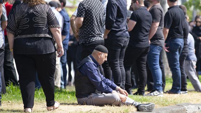 There was quiet reflection and despair at today’s gathering. Picture: Sarah Matray