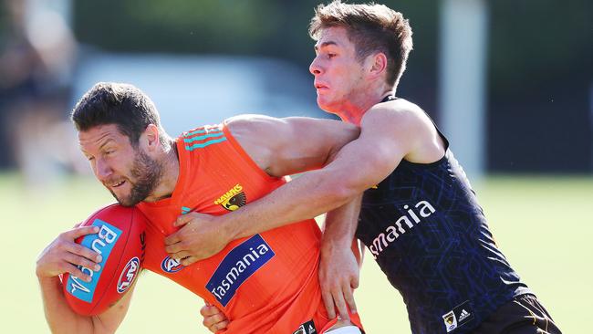 Dylan Moore tackles James Frawley during Hawthorn’s intra-club match earlier in the pre-season.