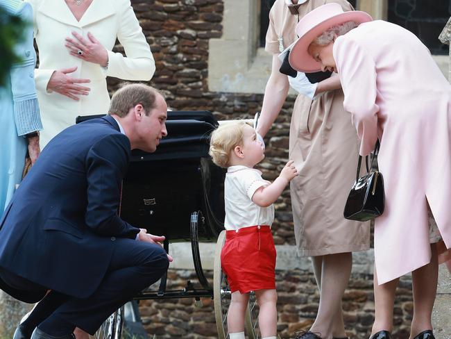 Prince George talks to his great-grandmother the Queen outside St Mary Magdalene on the Sandringham Estate for the christening of Princess Charlotte in 2015. Picture: Chris Jackson/Getty Images