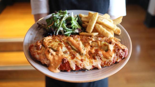 Eating a parma at the Skinny Dog should be on your Melbourne bucket list. Picture: Facebook.