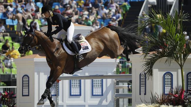 Australia's Edwina Tops-Alexander, riding Lintea Tequila, competes in the equestrian jumping.