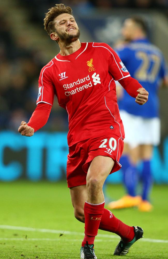 Adam Lallana of Liverpool celebrates after scoring the equaliser against Leicester.