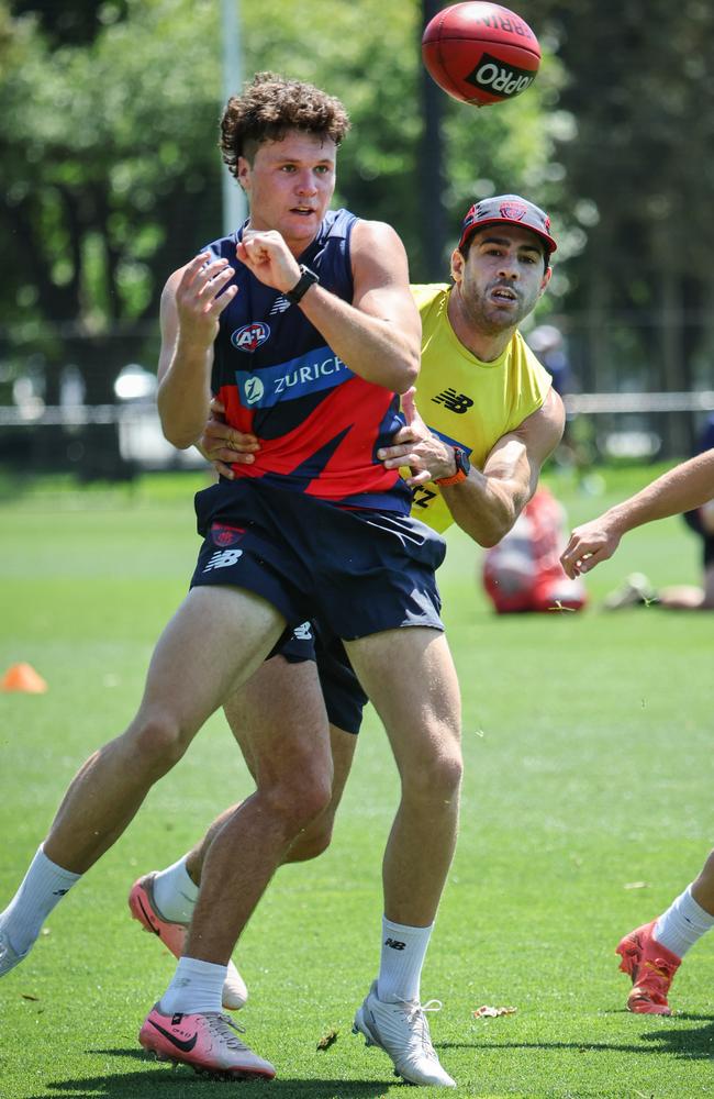 Christian Petracca tackles Harvey Langford. Picture: David Caird