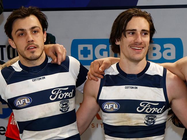 GEELONG, AUSTRALIA - JULY 15: (L-R) Brad Close, Gryan Miers and Tom Atkins of the Cats sing the team song during the 2023 AFL Round 18 match between the Geelong Cats and the Essendon Bombers at GMHBA Stadium on July 15, 2023 in Geelong, Australia. (Photo by Michael Willson/AFL Photos via Getty Images)