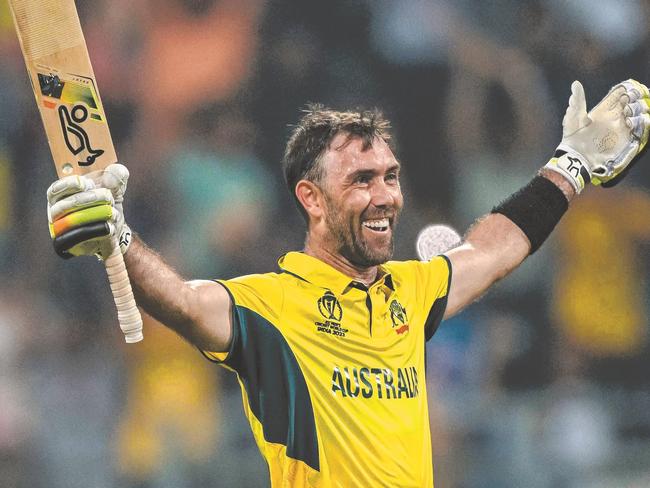 Australia's Glenn Maxwell celebrates after winning the 2023 ICC Men's Cricket World Cup one-day international (ODI) match between Australia and Afghanistan at the Wankhede Stadium in Mumbai on November 7, 2023. (Photo by INDRANIL MUKHERJEE / AFP) / -- IMAGE RESTRICTED TO EDITORIAL USE - STRICTLY NO COMMERCIAL USE --