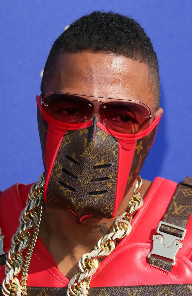Nick Cannon sported a bizarre Louis Vuitton vest and face mask at the MTV Movie & TV Awards in Los Angeles. Picture: AFP