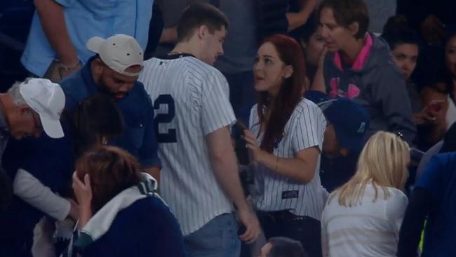 RED SOX FAN AWKWARDLY PROPOSES TO GIRL FRIEND