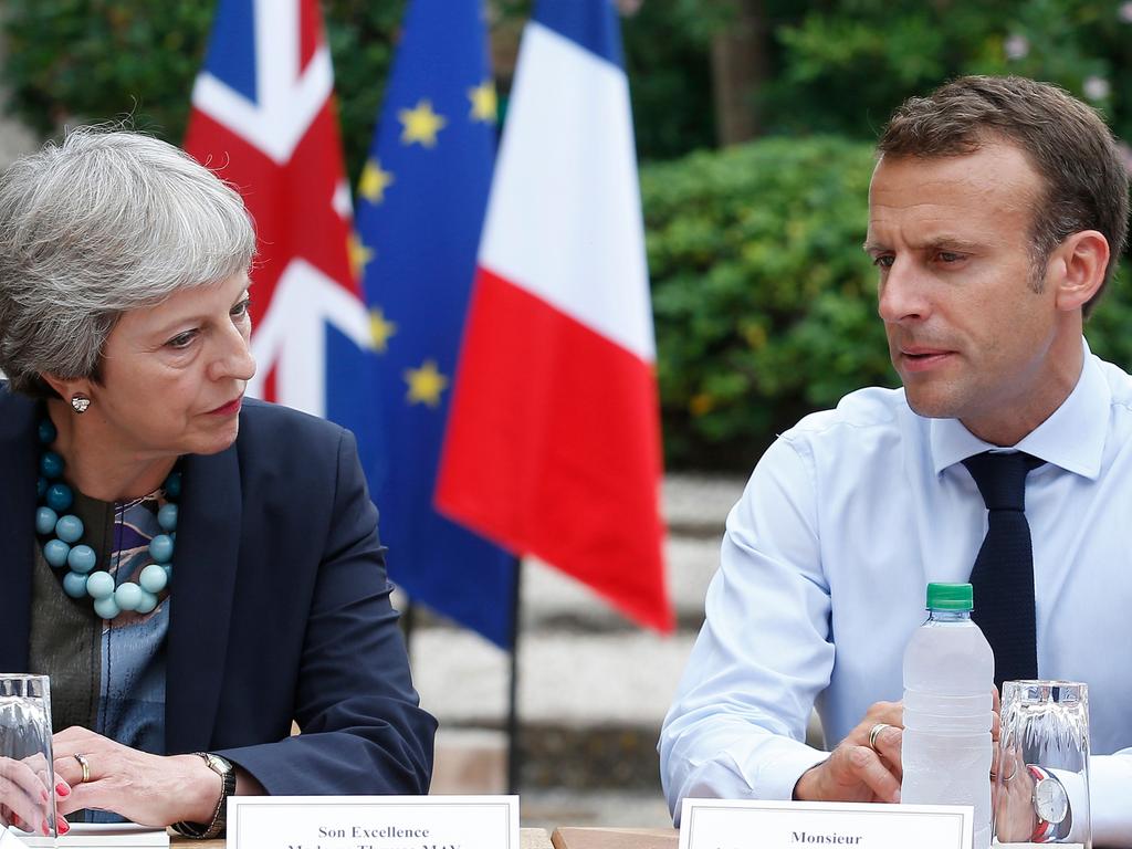 French President Emmanuel Macron (R) speaks with British Prime Minister Theresa May (L). Picture: AFP