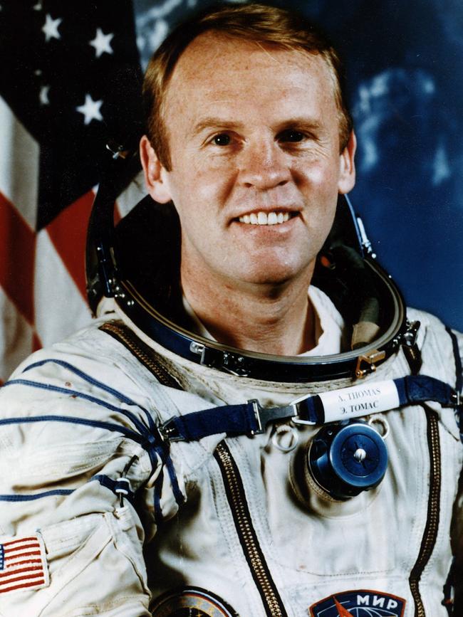 Dr Andy Thomas conducted his first trip into space in 1996.