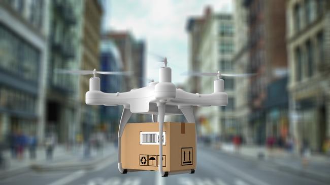 An artist’s impression of a delivery drone flying along the streets of New York City. Picture: iStock