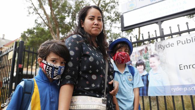 Mum Fabia Ricardo made masks for her kids Zane and Alex for their return to Ryde Public School today. Picture: John Grainger