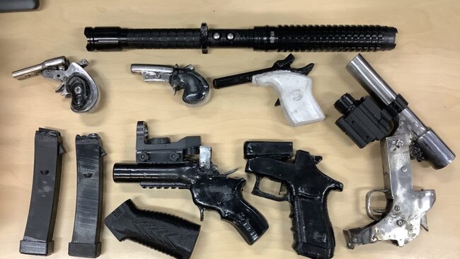 Officers from Logan District Drug and Firearm team have charged a man with multiple firearm and drug offences following the execution of a search warrant in Logan Village on Friday afternoon. Picture: Queensland Police