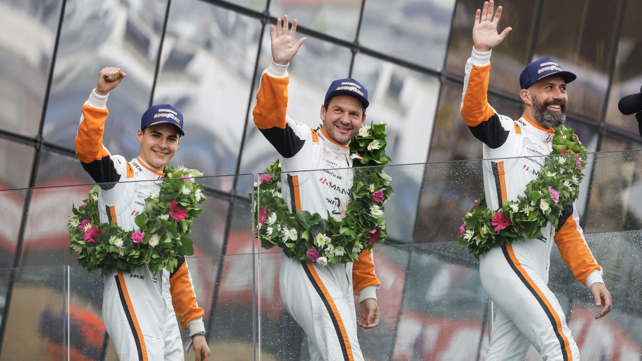 Yasser Shahin (right) with co-drivers Morris Schuring (left) and Richard Lietz (centre). Picture: Porsche