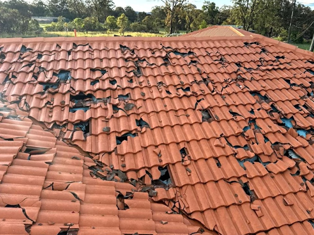 A roof smashed by hail. Picture: Higgins Storm Chasing