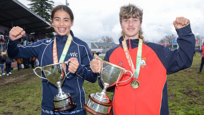 Victorian girls captain Isabelle Le and South Australian boys captain Harrison Webb with the winners trophies after the School Sport Australia U12 Australian Football Championships at Norwood Oval. Picture: Brenton Edwards