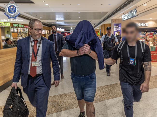 , Man extradited to NSW over alleged sexual and robbery offences – Goulburn, Thursday, 27 April 2023 07:00:32 AM, , PLEASE NOTE: NSWPF-branded footage of the arrest in WA and the extradition is available via Hightail: https://spaces.hightail.com/receive/ONvkhyjtzq, , NSW detectives have extradited a man from Western Australia and charged him with alleged aggravated robbery and sexual offences, following an investigation into incidents in Goulburn earlier this month., , Detectives from the State Crime Command’s Sex Crimes Squad, assisted by The Hume Police District, established Strike Force Noobillia to investigate reports of a physical and sexual assault of a 19-year-old woman., , Police will allege in court the woman was walking north along Bourke Street, Goulburn, when she was approached by an unknown man about 11pm on Friday 14 April 2023., , When at the intersection of Addison and Bourke streets, the man allegedly grabbed the woman and punched her several times to the face, before she lost consciousness. Picture: NSW Police