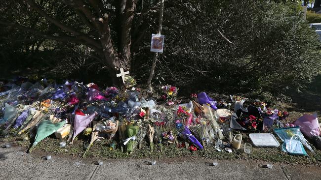 A flower tribute outside the house. Picture: Toby Zerna