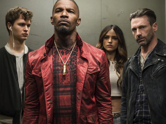 This image released by Sony/TriStar shows, from left, Ansel Elgort, Jamie Foxx, Eiza Gonzalez and Jon Hamm in a scene from the film, "Baby Driver." (Wilson Webb/Sony/TriStar via AP)