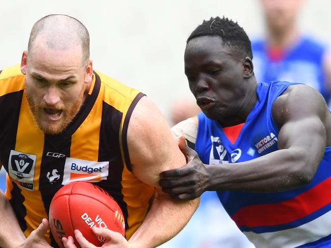 MELBOURNE, AUSTRALIA - MAY 12: Jarryd Roughead of the Hawks   is tackled whilst playing for the Box Hill Hawks in the VFL against the Footscray Bulldogs before the round eight AFL match between the Hawthorn Hawks and the Greater Western Sydney Giants at Melbourne Cricket Ground on May 12, 2019 in Melbourne, Australia. (Photo by Quinn Rooney/Getty Images)