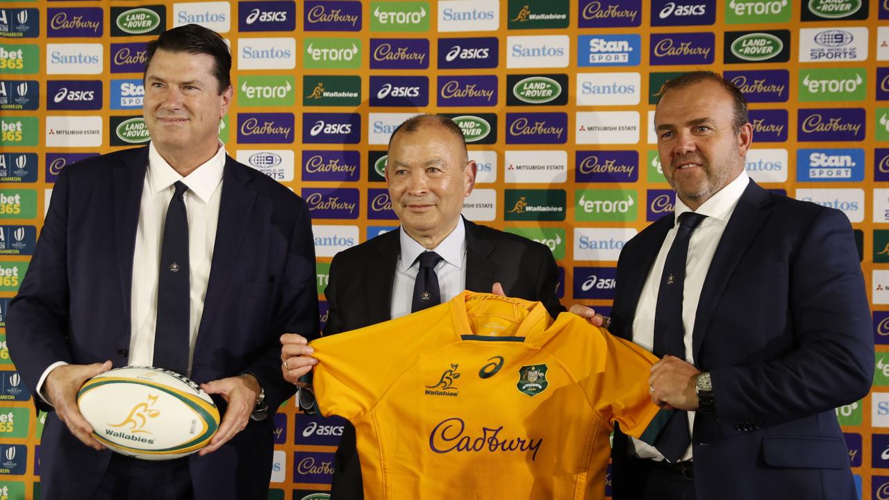 Wallabies head coach Eddie Jones (middle) during a press conference with Rugby Australia chair Hamish McLennan (left) and chief executive Andy Marinos (right). Picture: Tim Hunter.