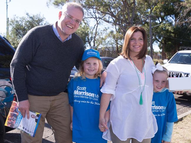 Scott Morrison with his wife Jenny and their children Lily (middle) and Abbey (far right). Picture: AAP 