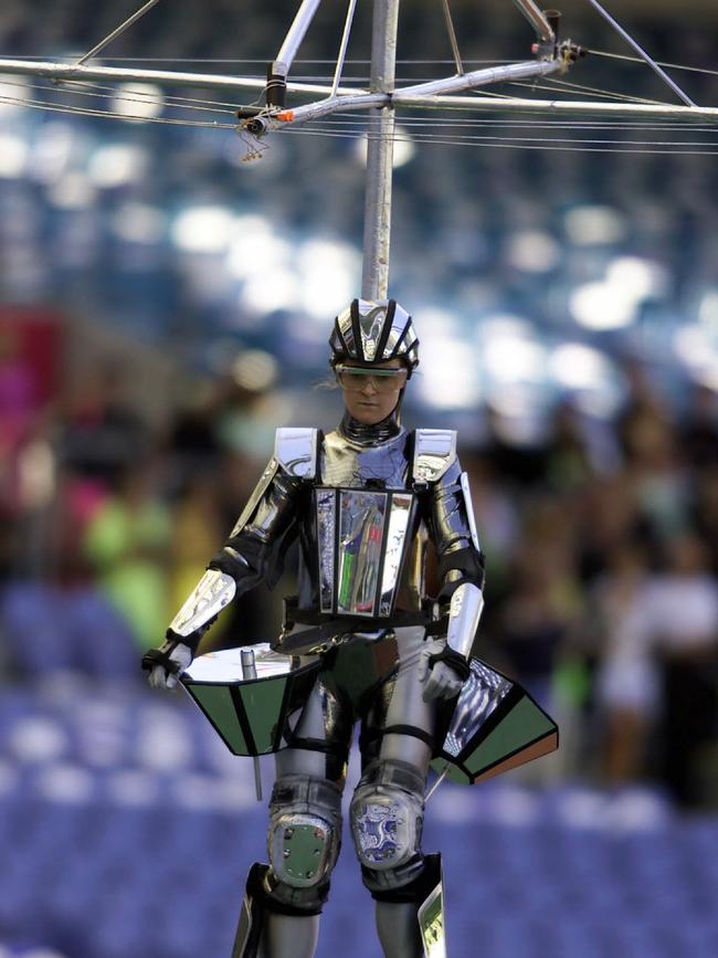 The Hills Hoist stiltwalker at Stadium Australia in Homebush during the Sydney 2000 Olympic Games closing ceremony dress rehearsal. Picture: Craig Borrow