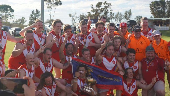 Miners celebrate their back-to-back FNFL flags. Picture: Supplied