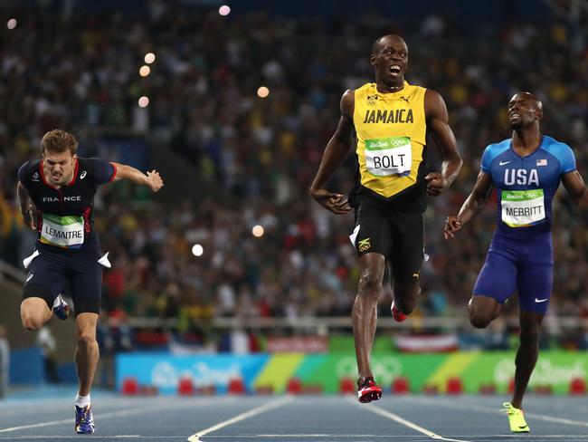 RIO DE JANEIRO, BRAZIL - AUGUST 18: Usain Bolt of Jamaica celebrates after crossing the finish line to win the Mens 200m final on Day 13 of the Rio 2016 Olympic Games at the Olympic Stadium on August 18, 2016 in Rio de Janeiro, Brazil. (Photo by Cameron Spencer/Getty Images)