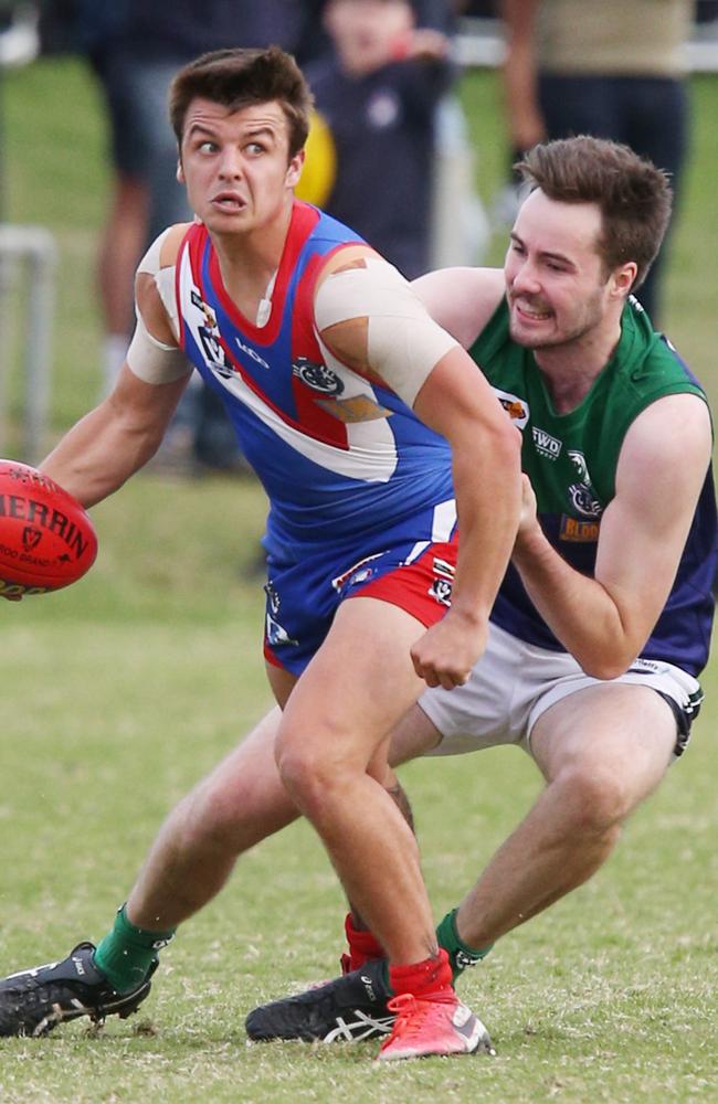 South Barwon’s Jackson Carmody is tackled by St Mary's Trent McMullin. Picture: Mark Wilson