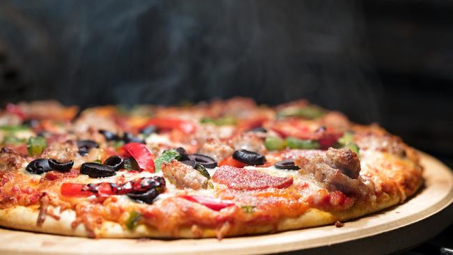 Four overseas workers employed at a Crust Pizza outlet in Hobart were unlawfully paid much less than their Australian colleagues because they were migrants.