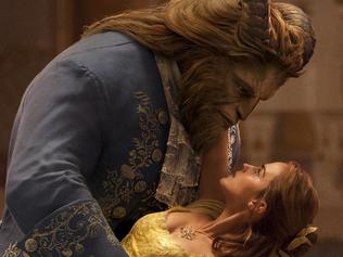 This image released by Disney shows Dan Stevens as The Beast, left, and Emma Watson as Belle in a live-action adaptation of the animated classic "Beauty and the Beast." (Disney via AP)