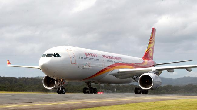 A Hong Kong Airlines flight arrives at Gold Coast Airport - services will cease later this year. Picture Mike Batterham