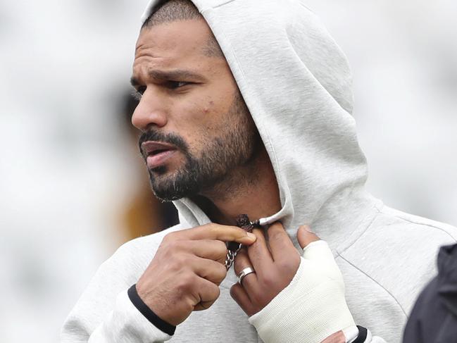 Indian opener Shikhar Dhawan at training with his left hand in a cast. Picture: AP