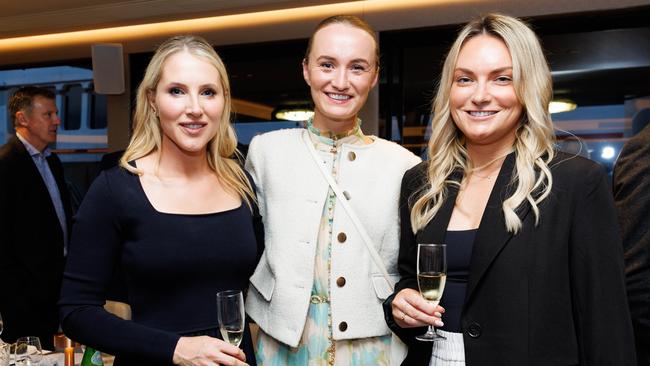 Ally Mosley, Emma Coleman and Sally Williams on The Jackson superyacht for the barrier draw. Picture: David Swift