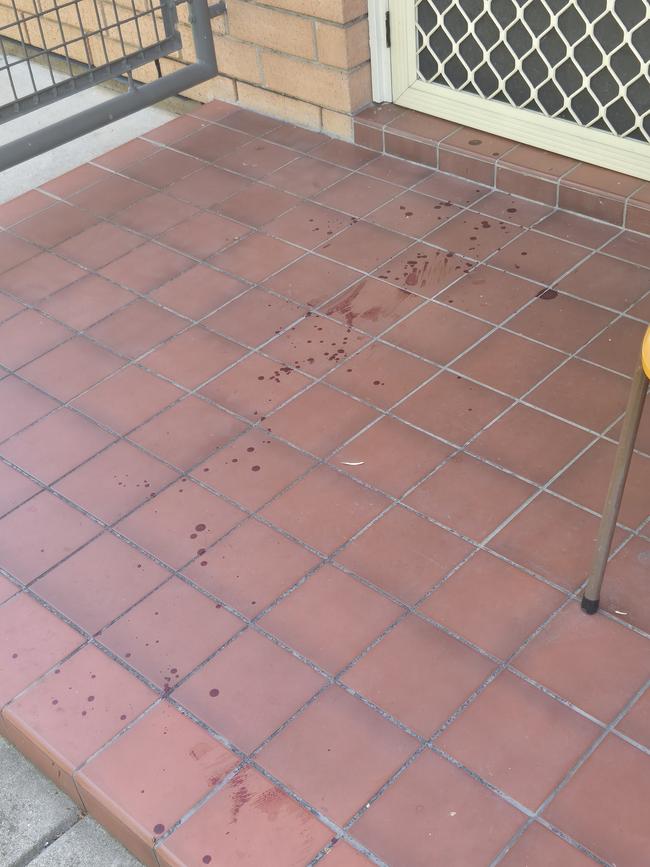 A trail of blood from an apartment’s front door. Picture: Dasha Havrilenko