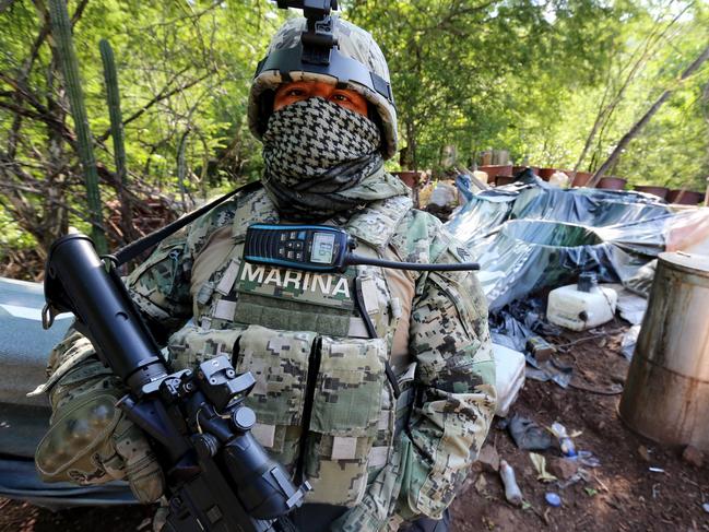 The Sinaloa State Police and Mexican Marines conceal their identities in the fight against the cartels. Picture: Nathan Edwards